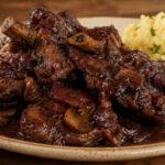 Chivito al Malbec Receta